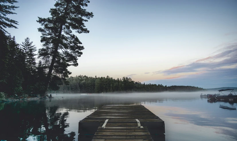 a dock sits at the edge of a body of water