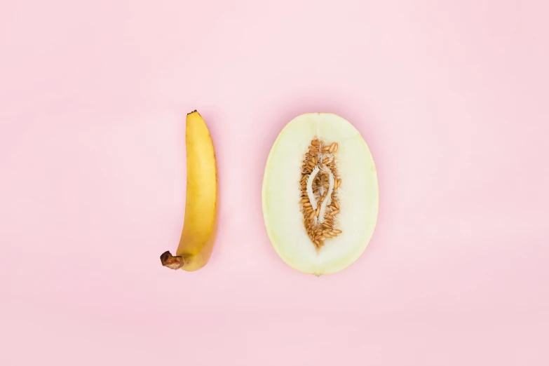 an apple, banana and kiwi laying in the shape of a face