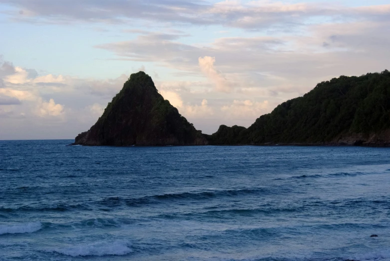 a large body of water near several mountains