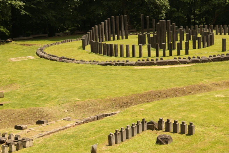 an array of stones in a park like structure