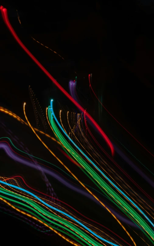 light trails and streaks created by vehicles on a highway