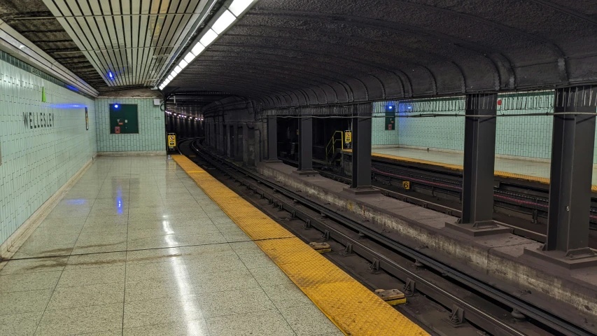 the subway is waiting to pick up passengers