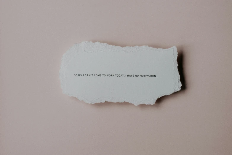 a piece of paper with a message cut out of it