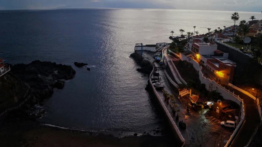 a beautiful night view from the sky at the ocean