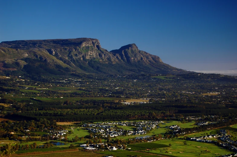 a view of a mountain with a valley on top