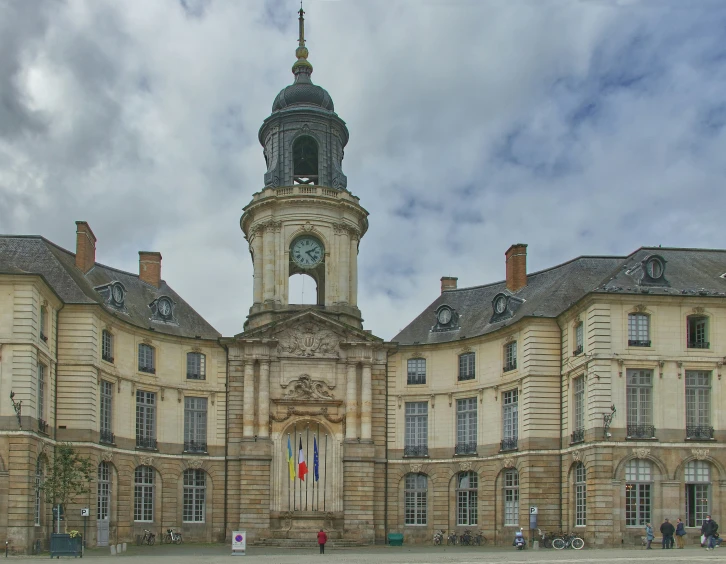 a large building that has a tower and a clock on it