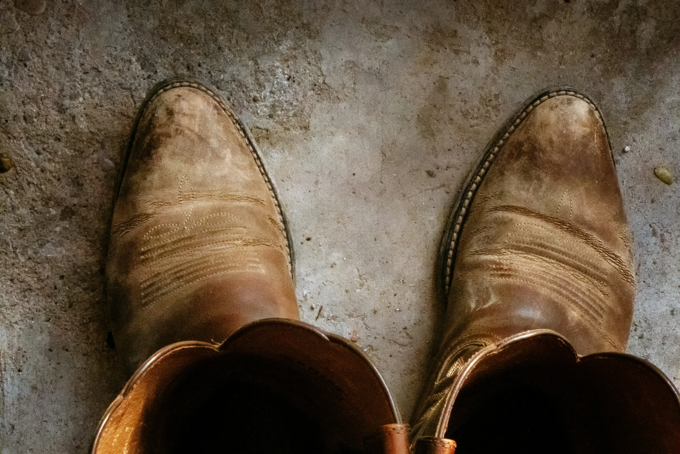 a person standing with boots on the ground