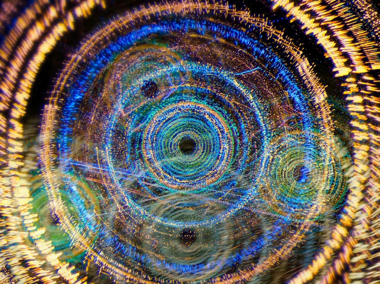 the inside of a computer screen with a swirling pattern