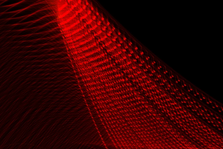 a red lines design with dark background