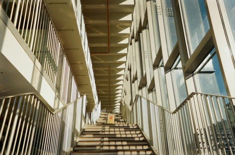 some stairs going up the side of some buildings