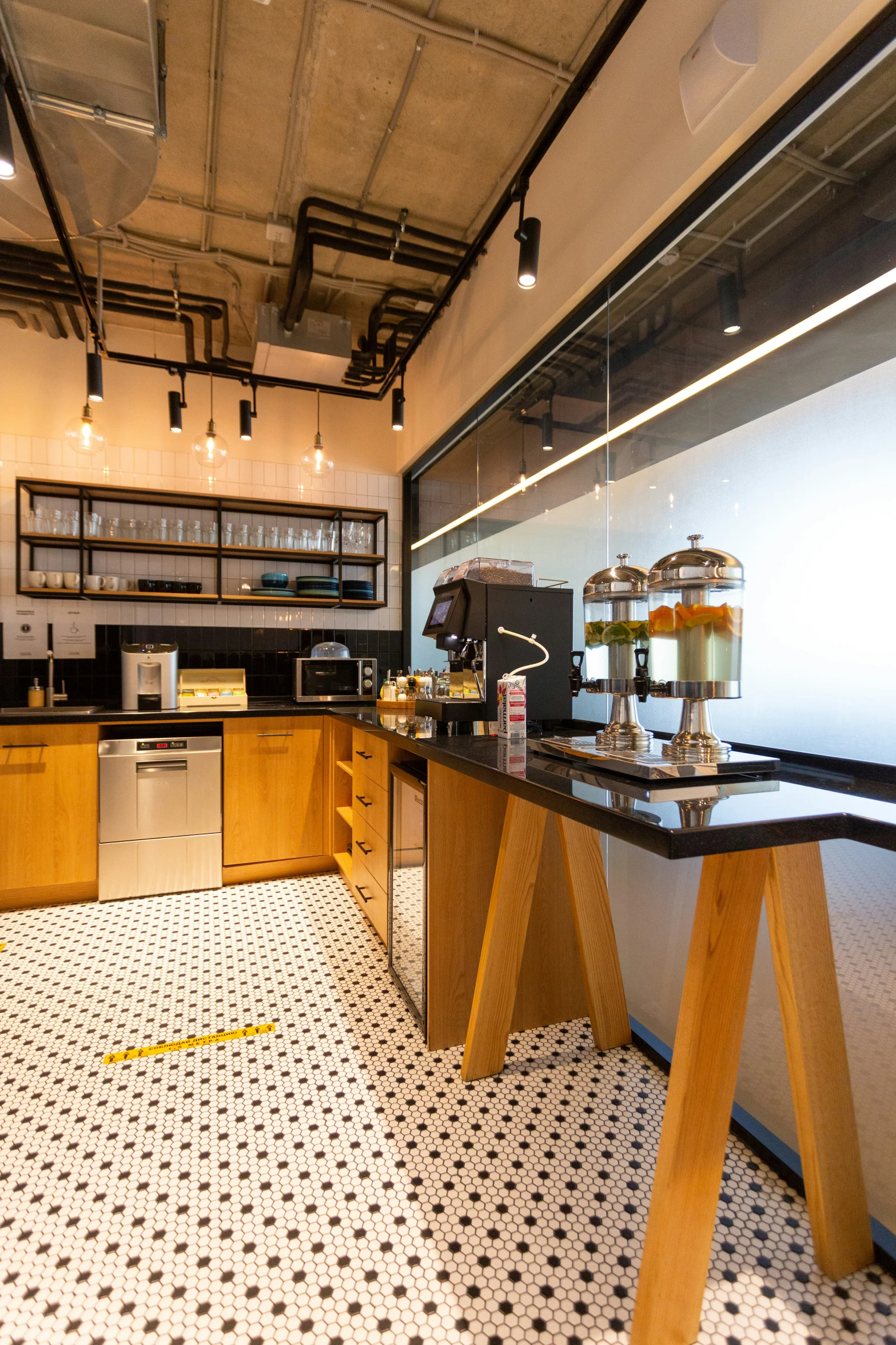 a black and white tiled floor with brown counter tops