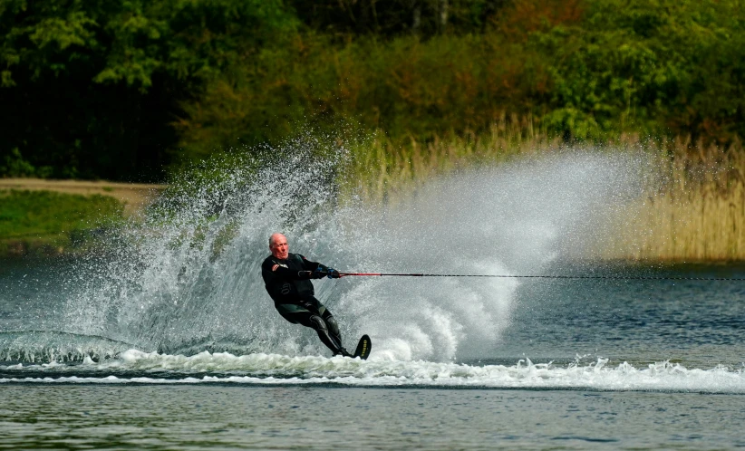 a person riding skis on a body of water