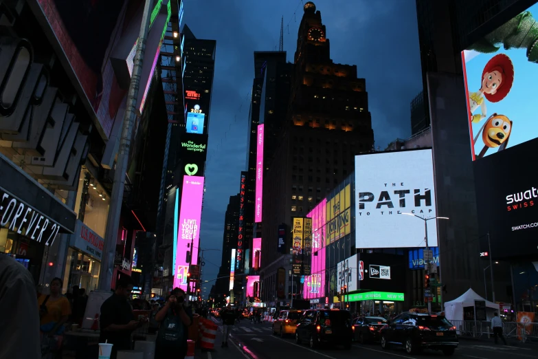 times square and 42nd street with skyscrs lit up in the background