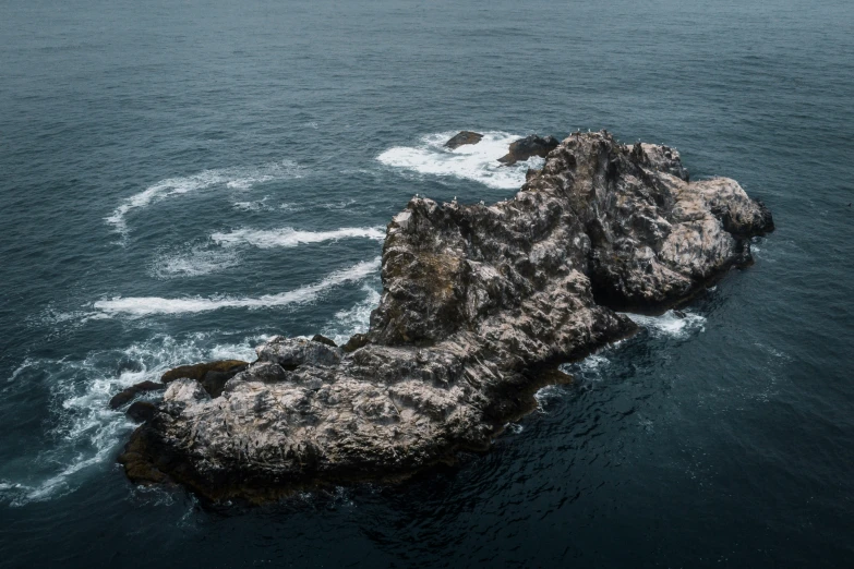 two islands that are sitting in the water