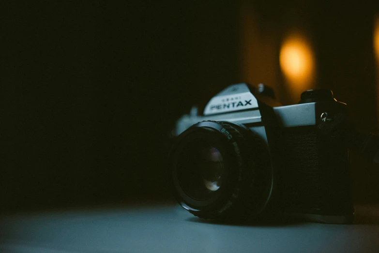 an image of a camera sitting in the dark