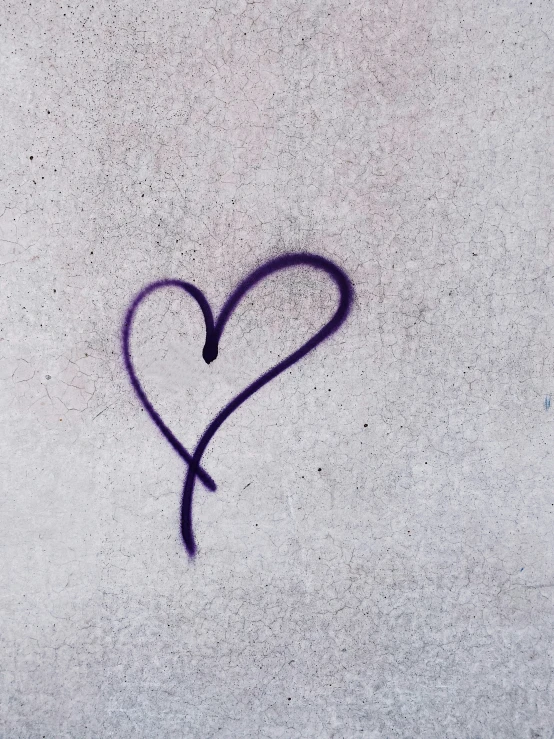 the word love in graffiti written into the concrete