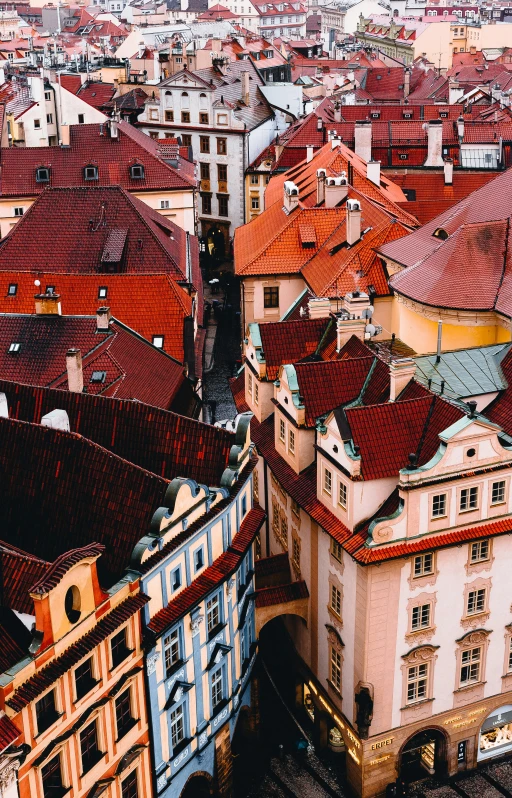 an aerial s of an old city area with red roofs