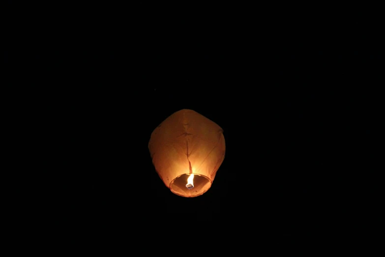 a paper lantern hanging from the ceiling