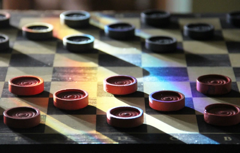 a checkered pattern with an assortment of metal objects