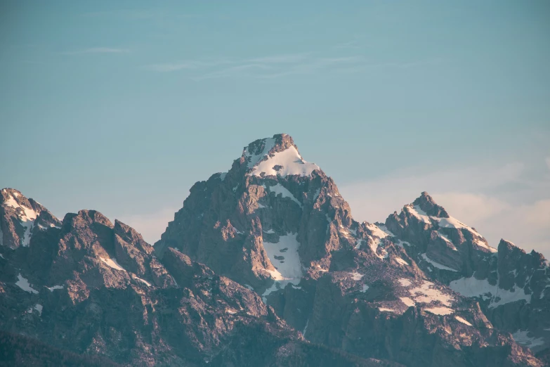 a view of a large mountain covered in snow