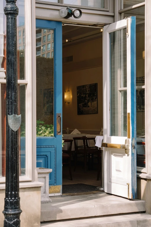 a table in a room with blue doors