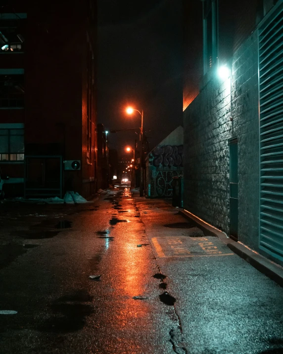 two men stand in the dark in an alley