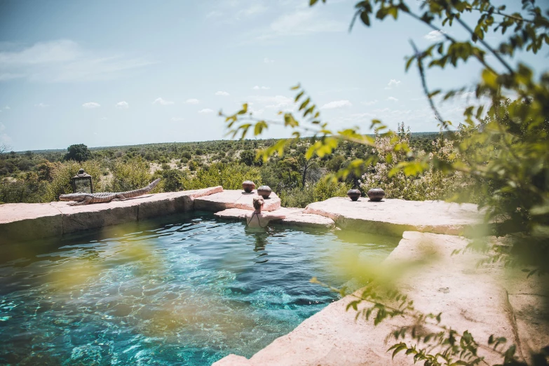 a pool with a view over the landscape