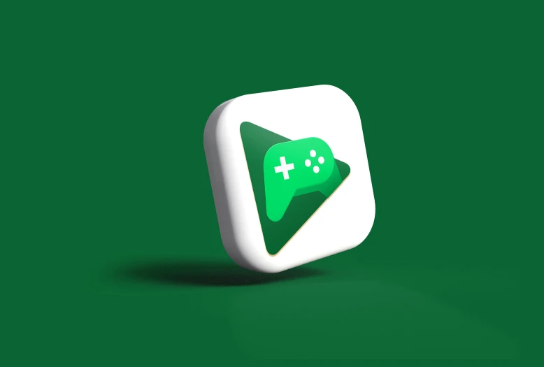 a green and white play on with two icons on it