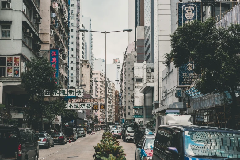 a large city street filled with lots of buildings