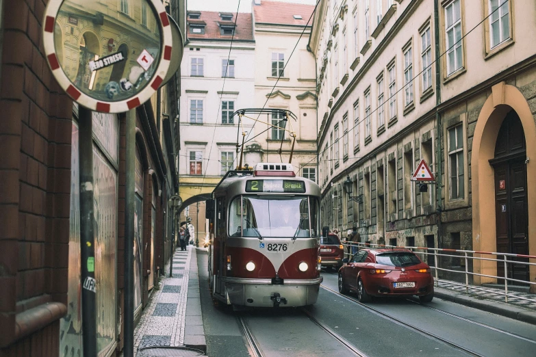 the public transit bus is moving down the road