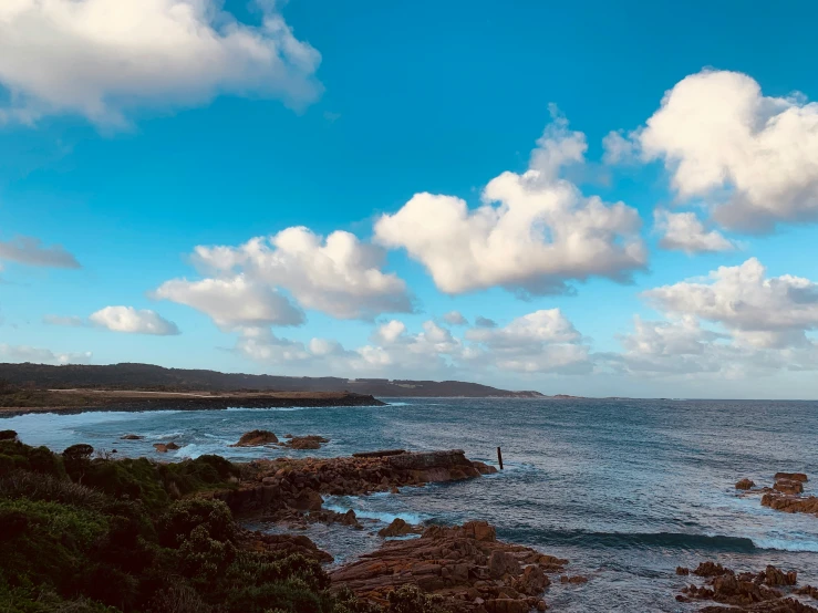 a view of the ocean and coastline from a distance