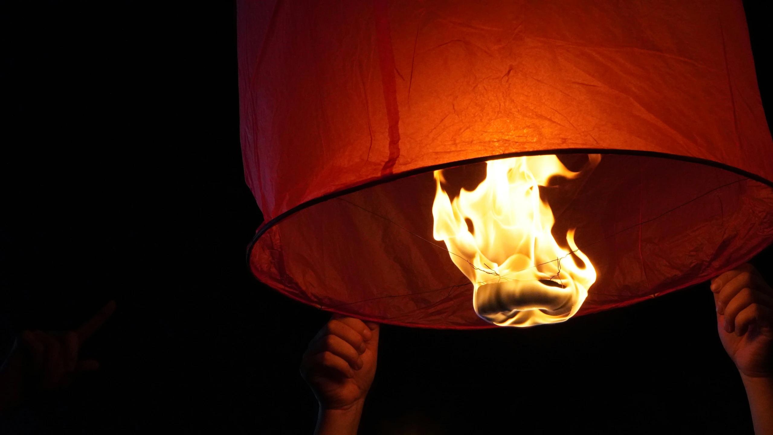 a paper lantern is glowing and the inside flames