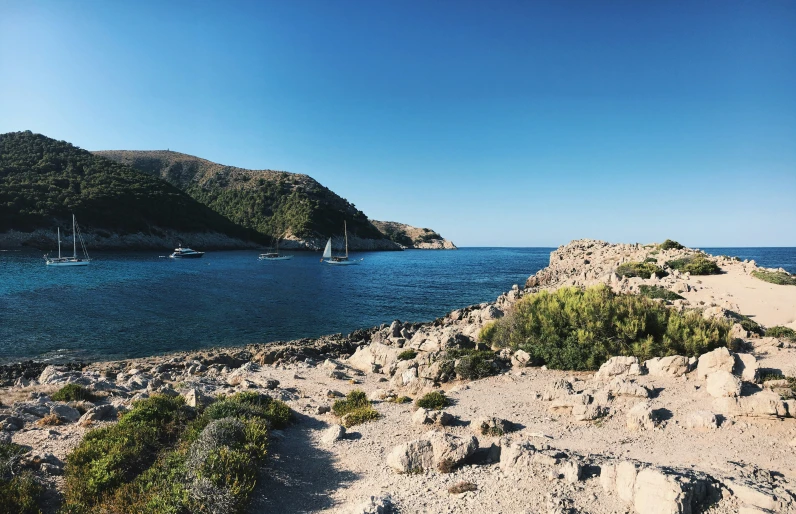 an image of some boats that are out in the ocean