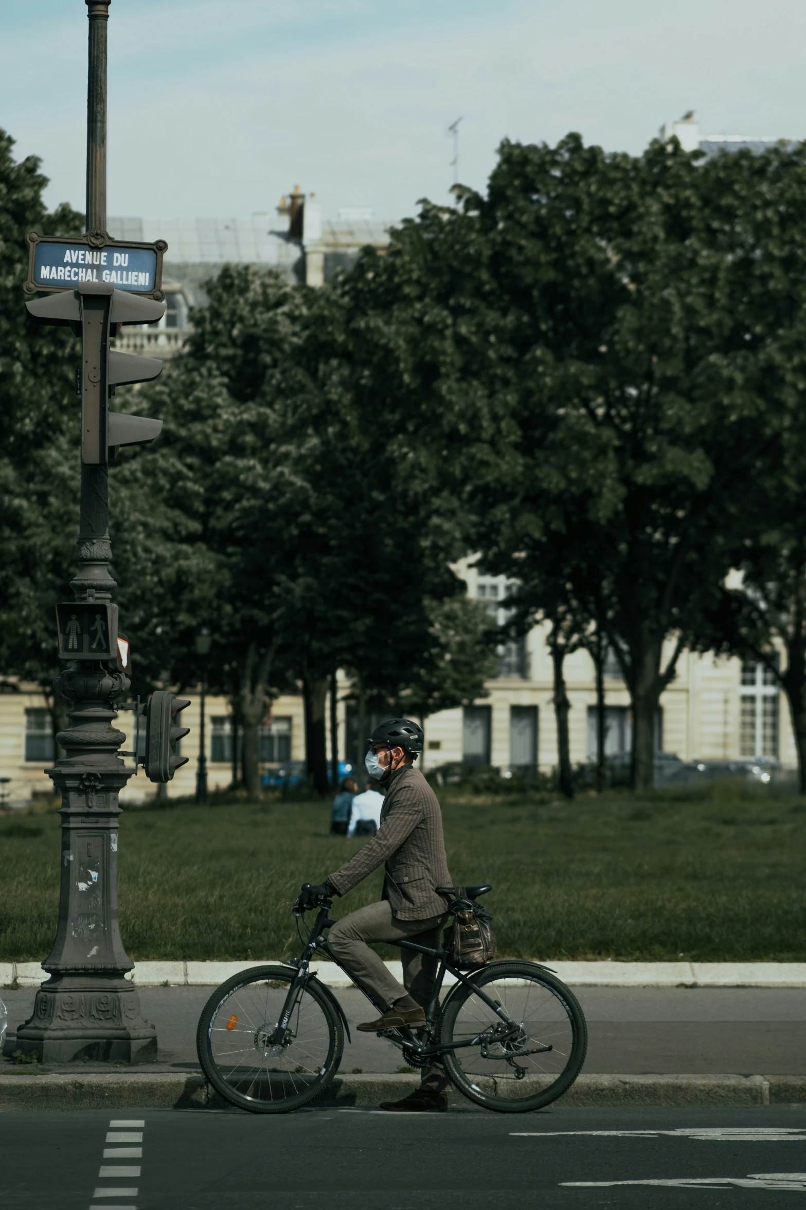 a person riding a bike on a street