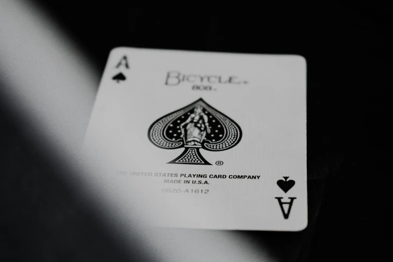 a black and white image of a playing card