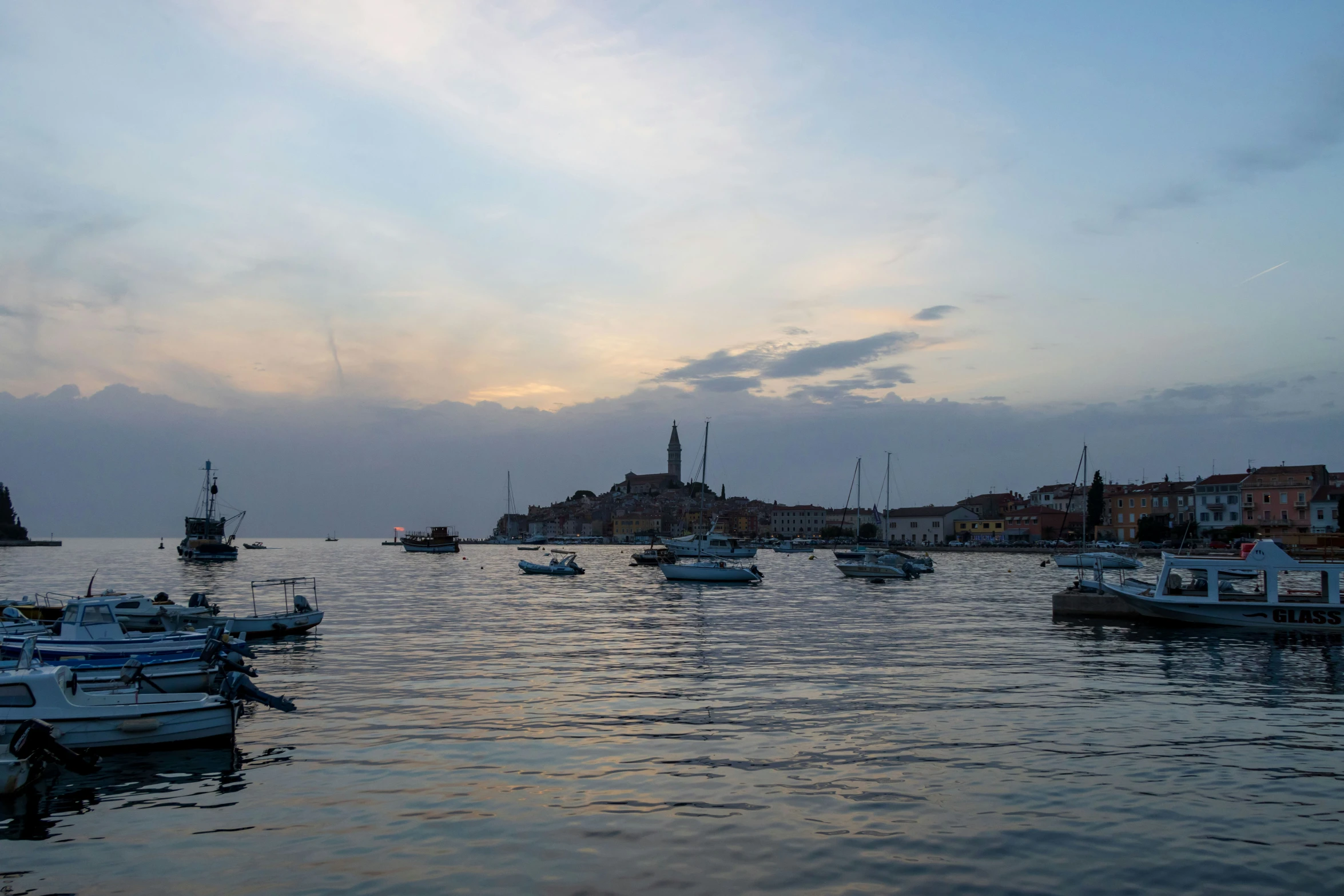 a body of water that has many boats floating in it