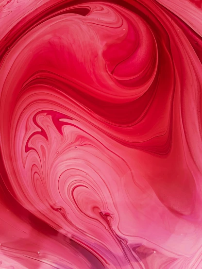 a pink swirled background with swirls