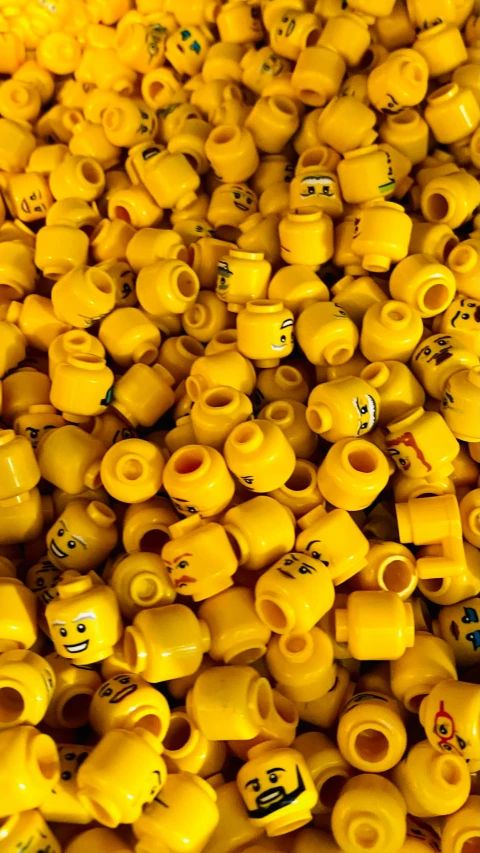 a pile of yellow pots that are full of yellow stuff