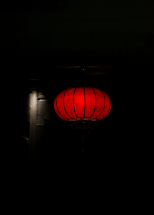 a lantern in the dark in a residential area