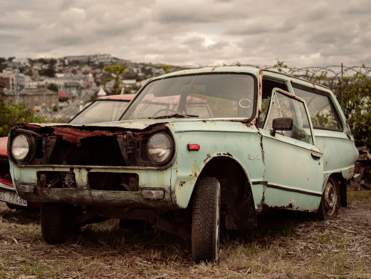 a dirty car with the hood down