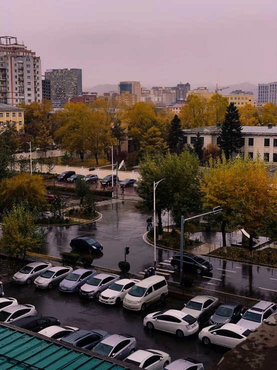 a parking lot that has many cars parked