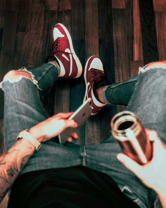 a person is reading a book on the floor