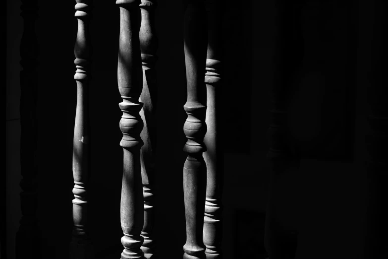an abstract view of a collection of wooden poles