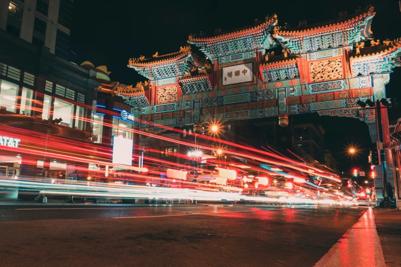 an outdoor area with many buildings lit up