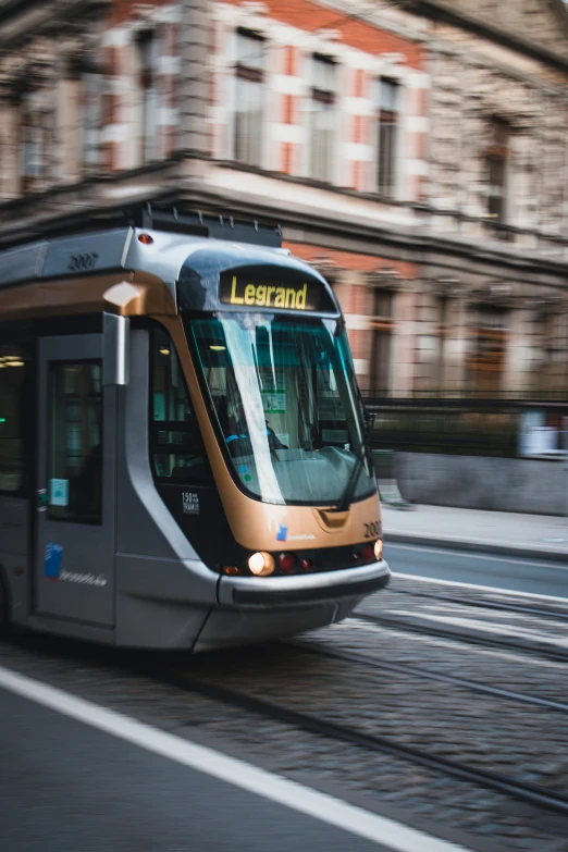 the subway train is moving around the track