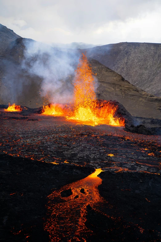 a lava that has some orange and black spewers on it