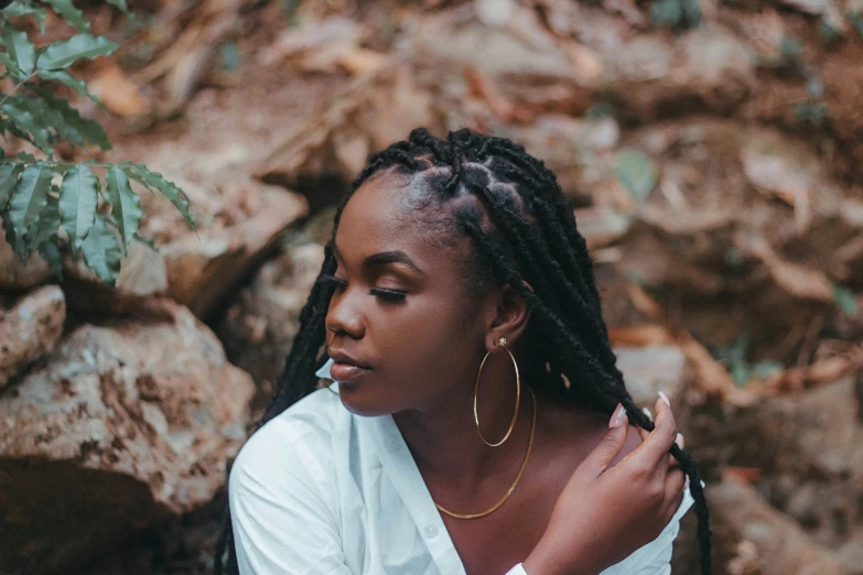 an image of a woman posing in the wilderness