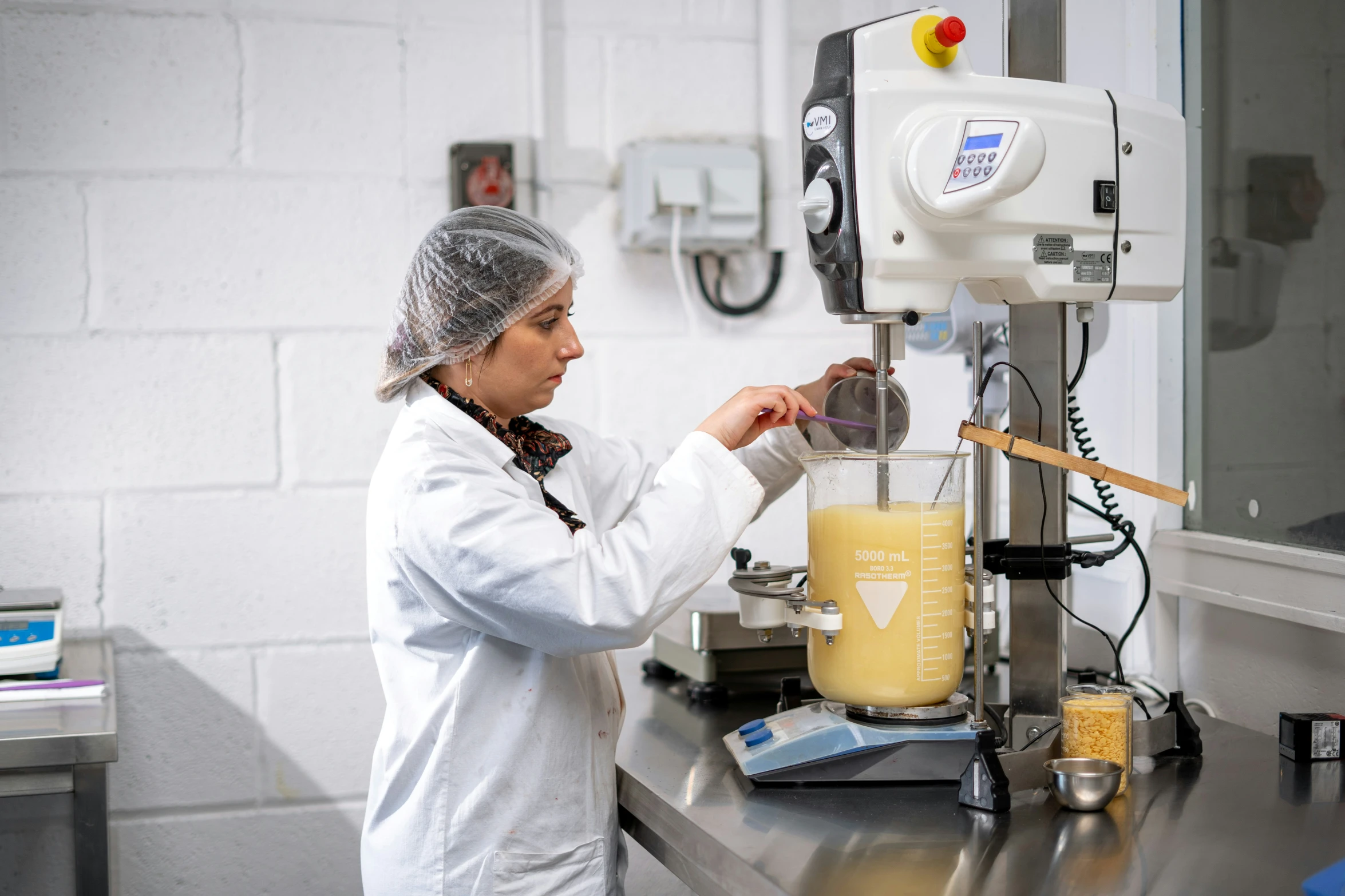 a woman working on soing in a science class