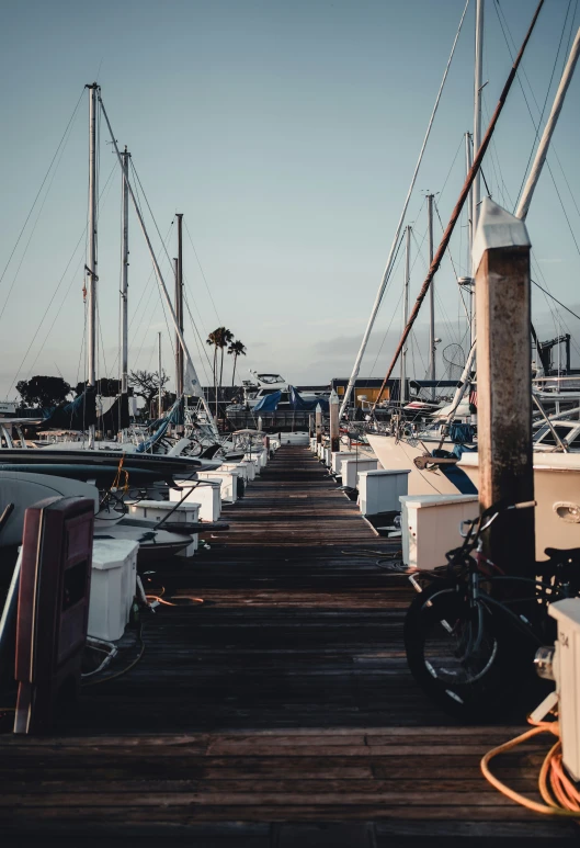 many boats that are sitting at the dock