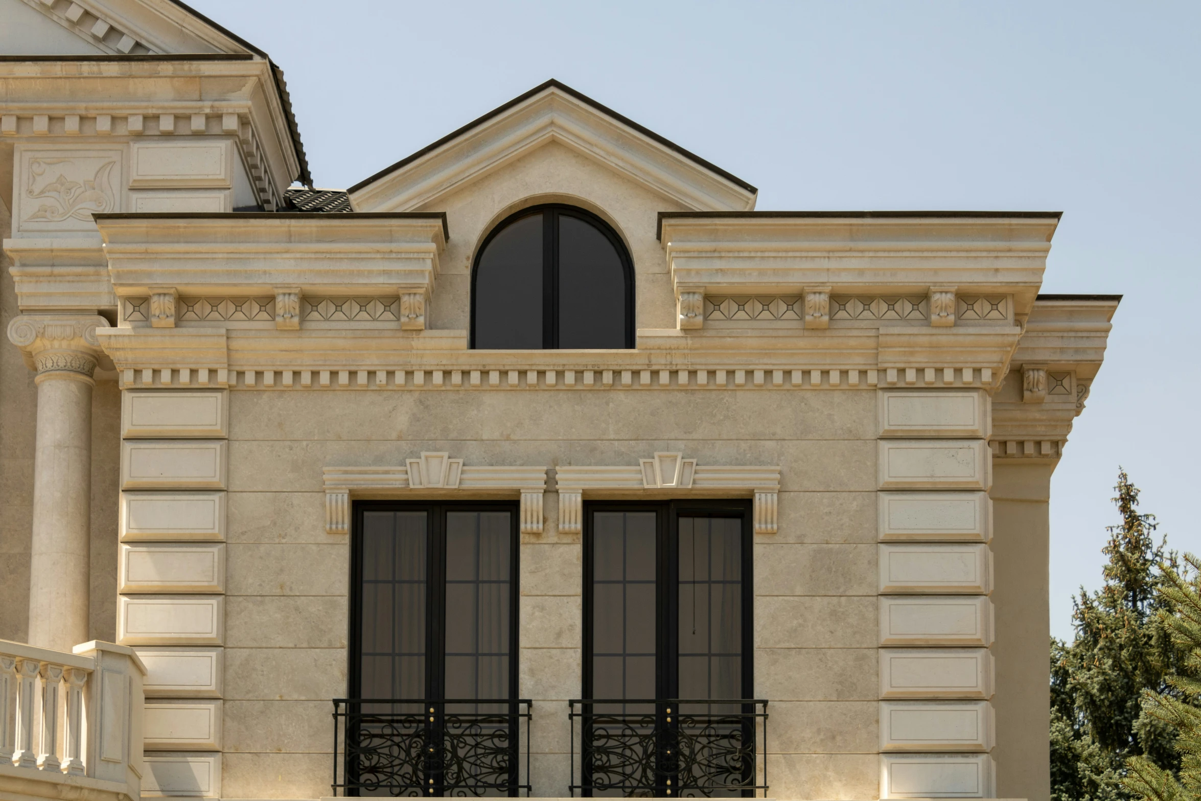 a very tall brick building with arched windows